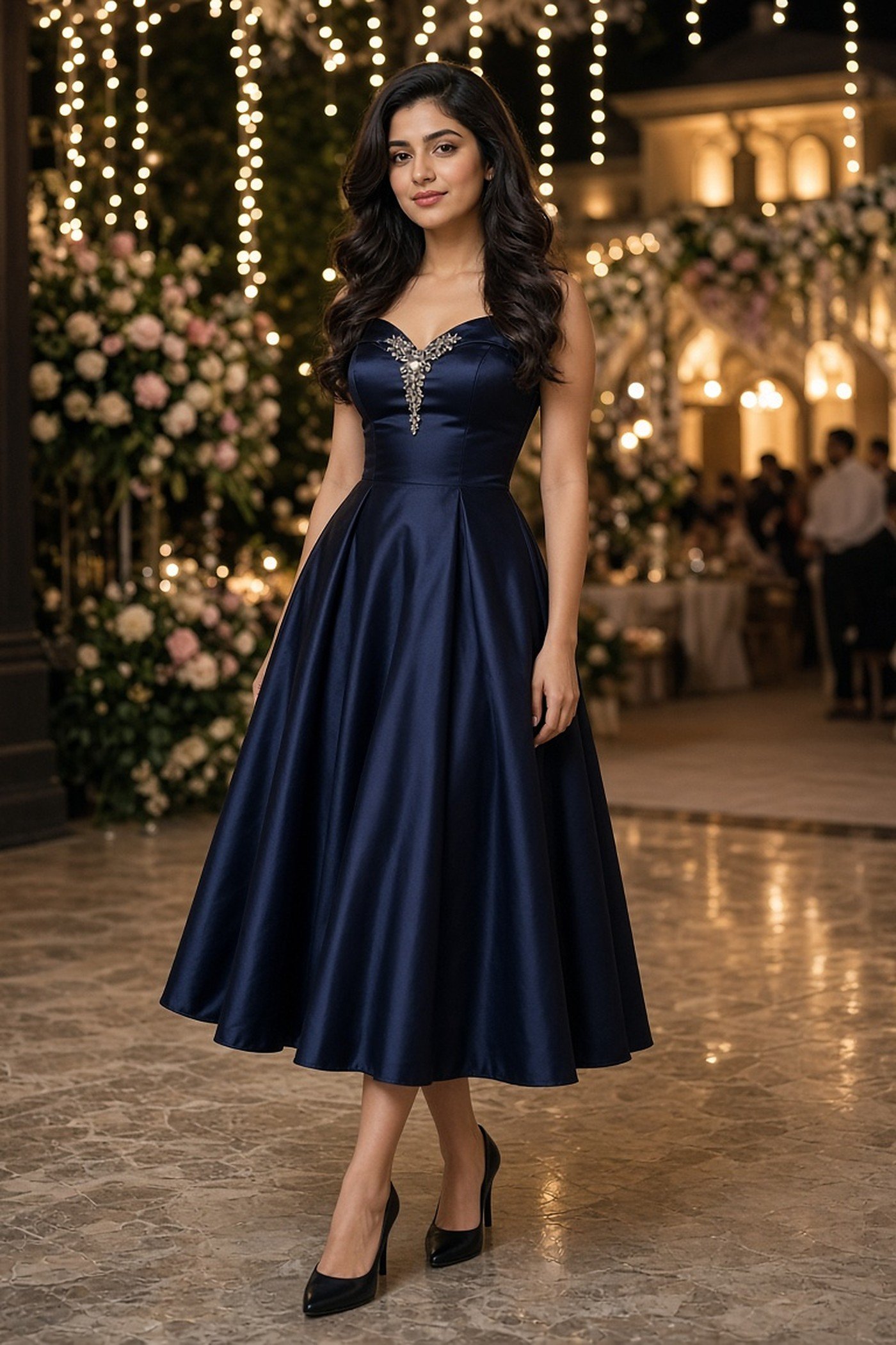 Woman in her 20s in a vintage midnight-blue satin cocktail dress at a wedding