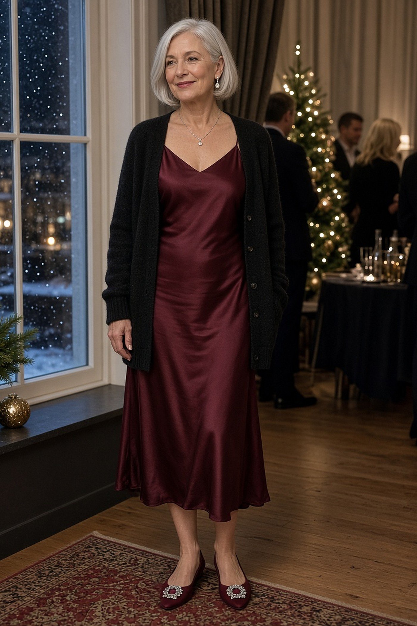 Woman over 50 in embellished burgundy flats with a satin slip dress