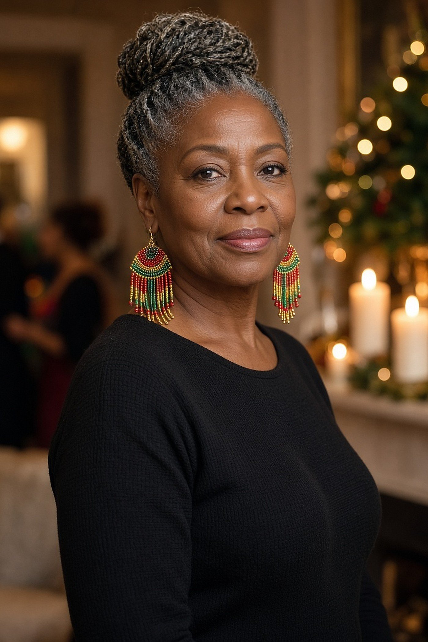 Woman over 50 wearing colorful beaded fringe earrings with a black knit dress